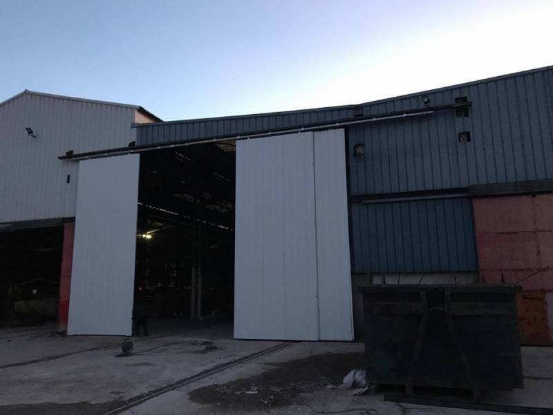 Rénovation de portes coulissantes pour hangar/entrepôt professionnel à Tassin la Demi Lune