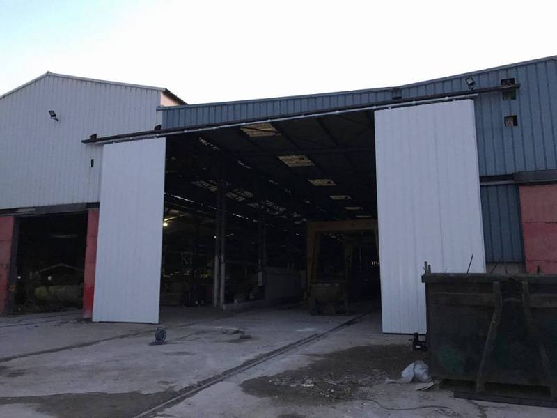 Rénovation de portes coulissantes pour hangar/entrepôt professionnel à Tassin la Demi Lune