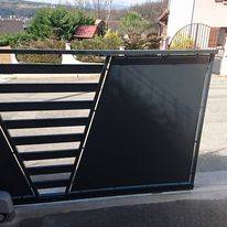 Portail coulissant ajouré en aluminium pour une maison d'un particulier à Francheville 69